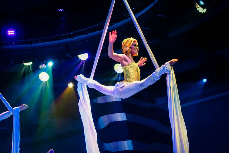 Silvia Dopazo performs a split balance on aerial silks