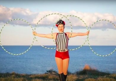 Emma Khourey holding four hula hoops