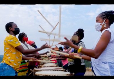 Ingoma Nyasha members juggling drumsticks