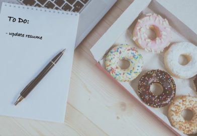 a To Do list that says update your resume next to a box of assorted donuts