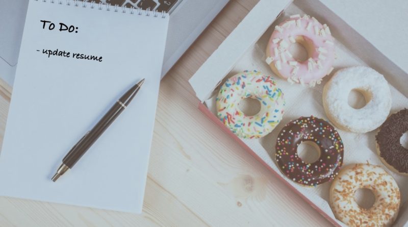 a To Do list that says update your resume next to a box of assorted donuts
