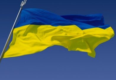 a Ukrainian flag blows in the wind