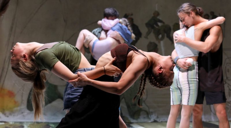 In La Putika's "Boom!," Czech and Hungarian acrobats embrace each other in two-person poses